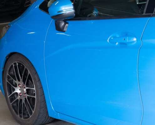body panel adhesive in a blue car