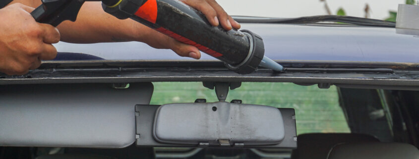 polyurethane adhesives being applied to car glazing