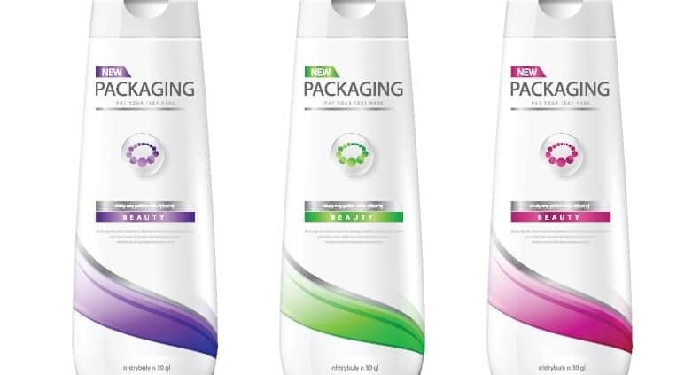 three shampoo bottles with wash-off labeling adhesive