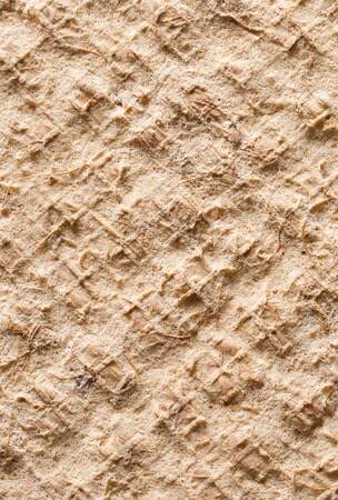 Compostable latex adhesive over backing with natural fibers (sisal, coconut fibers)