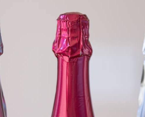 Champaign bottles with aluminum bottle wraps